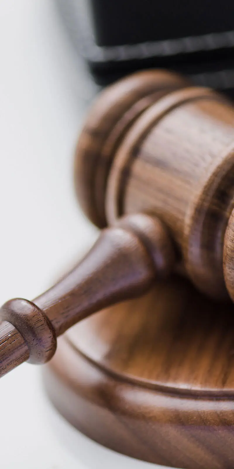 Gavel beside business documents
